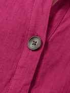 White pure linen age-defying shirt with button detail on mannequin