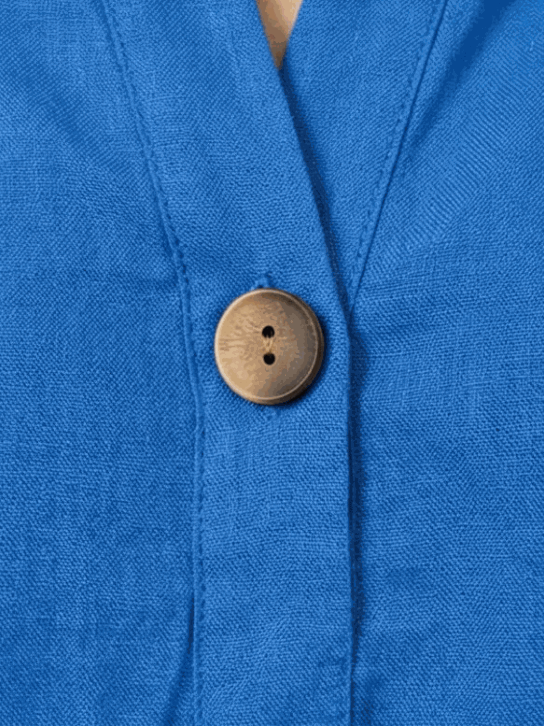 pure linen age-defying shirt with button detail on white background