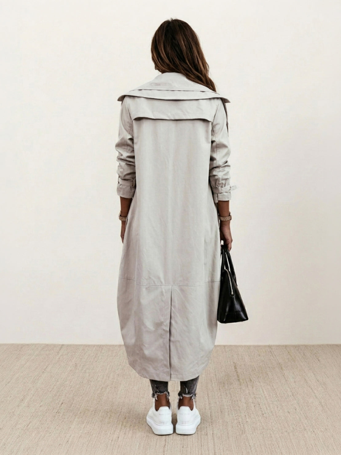 Plus size sleek minimalist hooded coat for travel, lightweight and oversized fit.