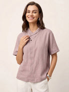 100% linen relaxed V-neck top with asymmetric button detail and short sleeves in navy blue