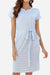 Woman wearing Airy Stripe Sheath Cotton Dress with blue and white stripes, short sleeves, crew neck, side pockets, and a tie waist belt