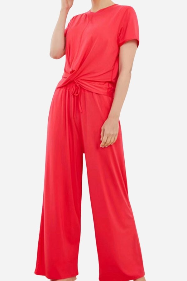 Red bamboo fiber pajama clothes with short sleeves and wide-leg pants, featuring a comfortable and eco-friendly design.