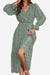 Green floral Bloom Wrap Midi Dress with V-neck, trumpet sleeves, and A-line silhouette