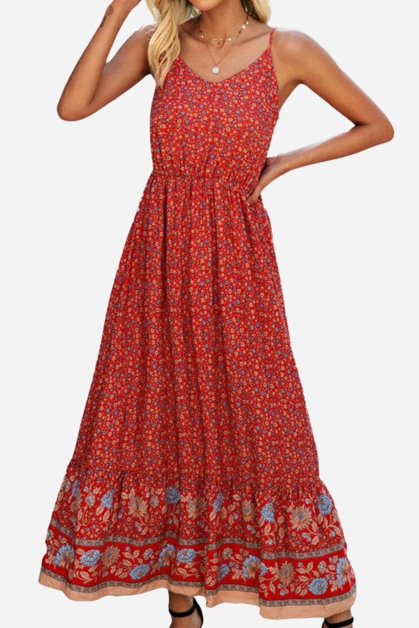 Woman wearing a casual vintage flower prints red maxi dress with spaghetti straps and elastic waist