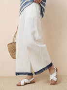 Coastal Comfort Linen two-piece set with lace details and breathable fabric