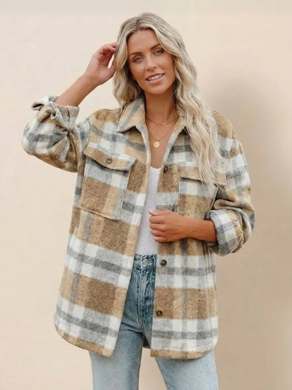 woman wearing comfy flannel classic button-down shirt in beige and white plaid