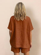 Comfy linen-like shirt and shorts two-piece set in breathable fabric for versatile casual wear