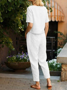 Straight-leg cotton linen monochrome pants with adjustable drawstring waist and natural texture