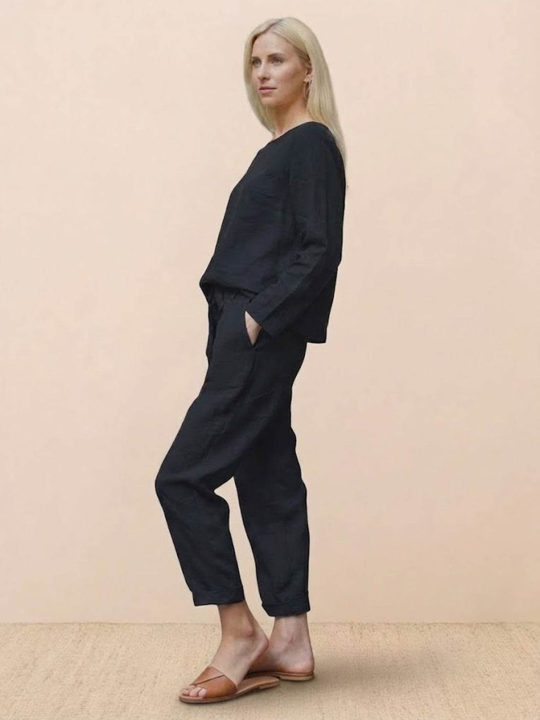 Woman modeling cotton-linen monochrome longline top and wide-leg pants set