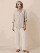Pure linen age-defying shirt with button detail, breathable and lightweight fabric perfect for warm weather.