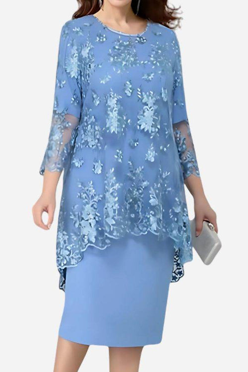 Elegant two-piece evening dress with delicate lace embroidered details in soft blue, featuring a flowing high-low hem and comfortable fit.