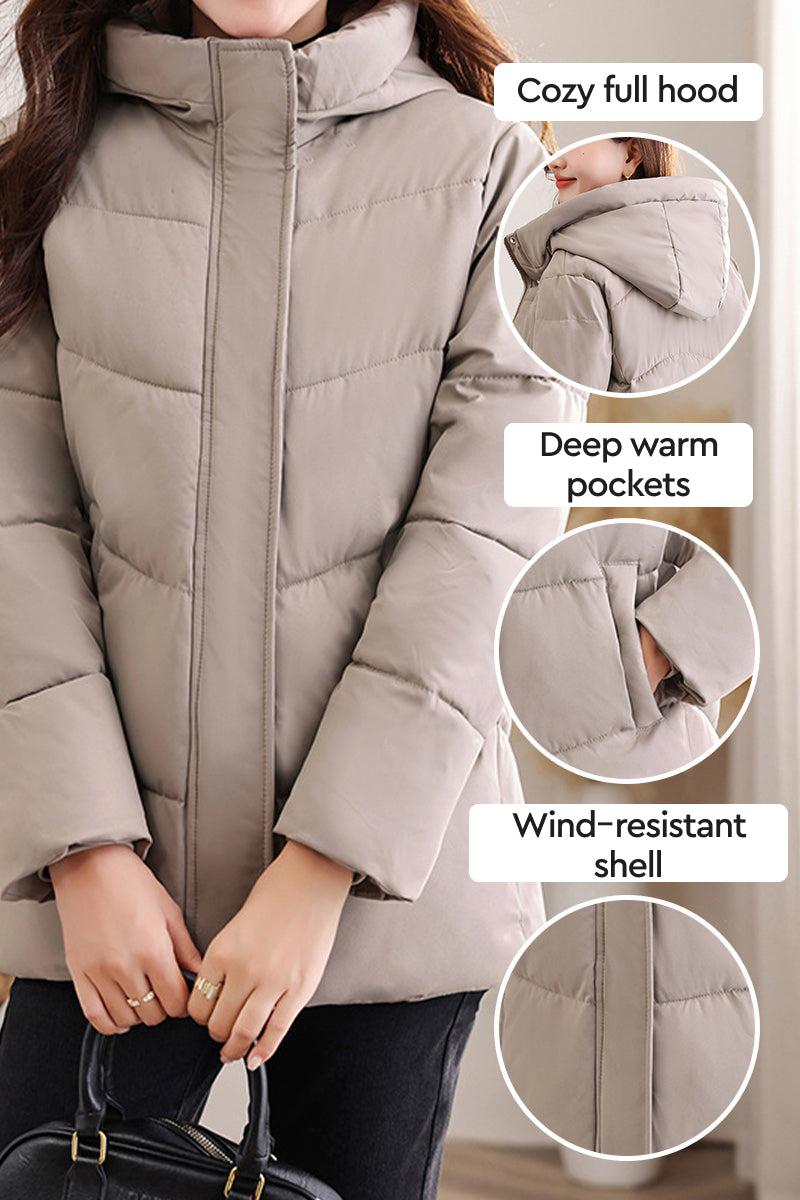 Everyday Warmth Coat mid-length hooded coat with 5-layer thermal insulation, wind-resistant shell, full hood, and deep warm pockets.