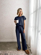 First Class Travel two-piece women's set in soft viscose-acrylic blend with pleated wide-leg pants and matching top for wrinkle-resistant comfort