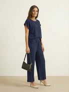 First Class Travel two-piece set in viscose-acrylic blend with pleated wide-leg pants and matching top for wrinkle-resistant, versatile comfort
