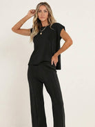 First Class Travel two-piece set in soft viscose-acrylic blend with pleated design and wide-leg pants for elegant, wrinkle-resistant comfort