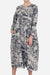 Japanese porcelain print midi dress with rounded neckline, 3/4 sleeves, oversized pockets, and loose fit.