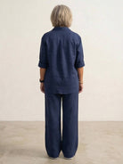 Model wearing oversized 100% cotton shirt and wide-leg pants co-ord set in relaxed fit