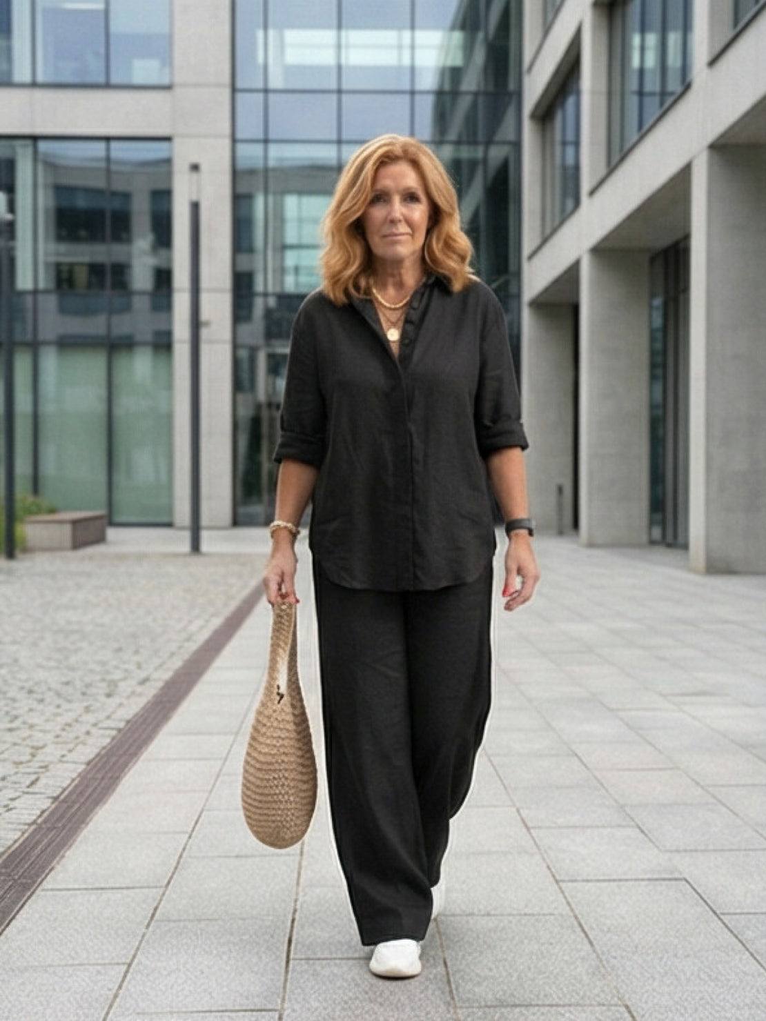 Model wearing oversized 100% cotton shirt with wide-leg pants co-ord set in relaxed fit