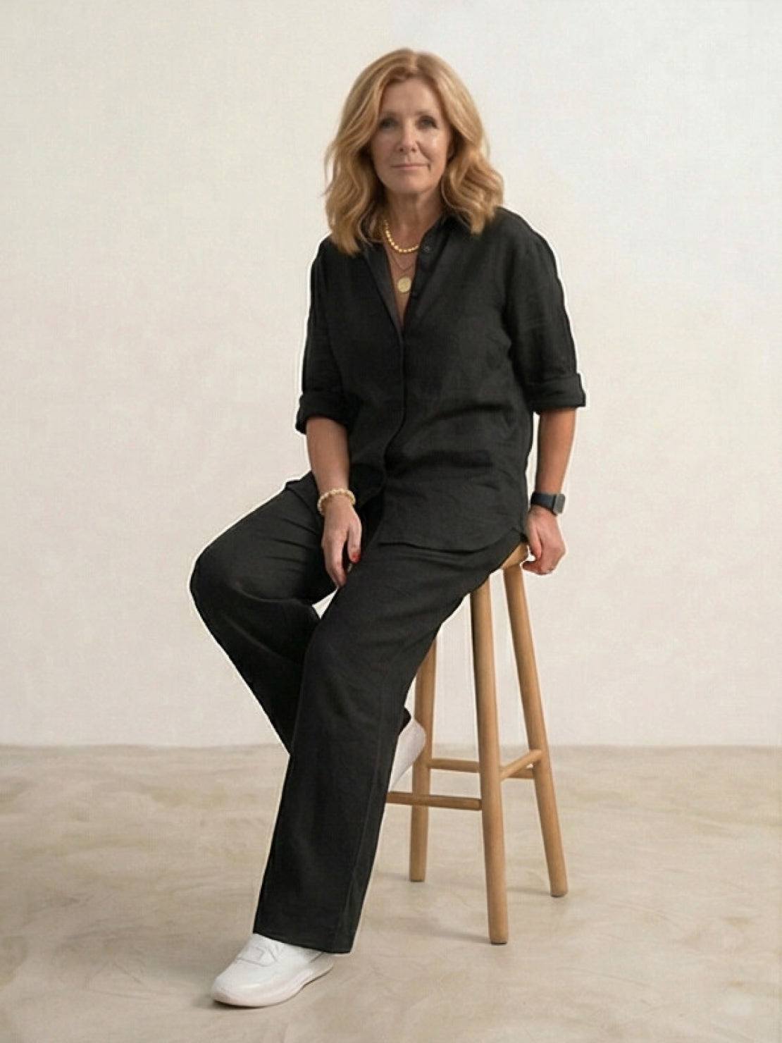 Model wearing oversized 100% cotton shirt and wide-leg pants co-ord set in relaxed fit