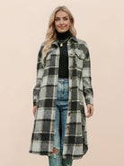 Oversized medium-length blue plaid wool-blend overshirt with relaxed fit and functional pockets
