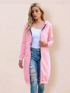 woman wearing pink oversized long zip sweatshirt hoodie with hood and front pockets