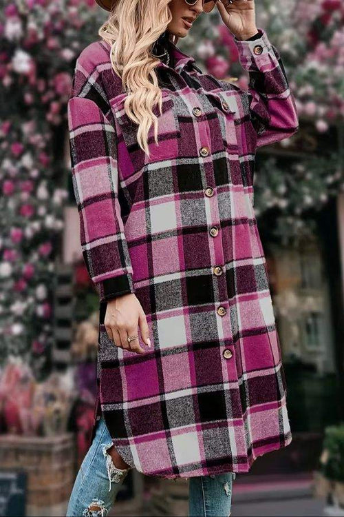 Oversized medium-length plaid overshirt in pink and black with button closure and long sleeves.