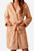 Beige premium comfort nightgown bathrobe with hood, front pockets, and adjustable belt, made of soft lightweight fleece material.
