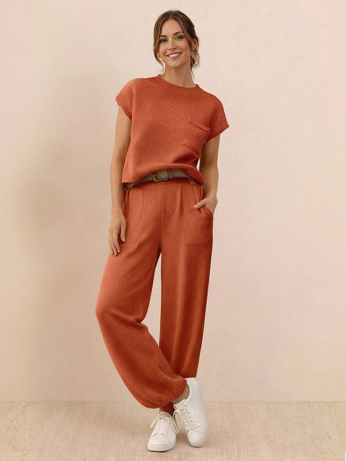 Woman wearing Comfy Couture Knit Sweater two-piece set in soft knit fabric with relaxed fit and matching pants