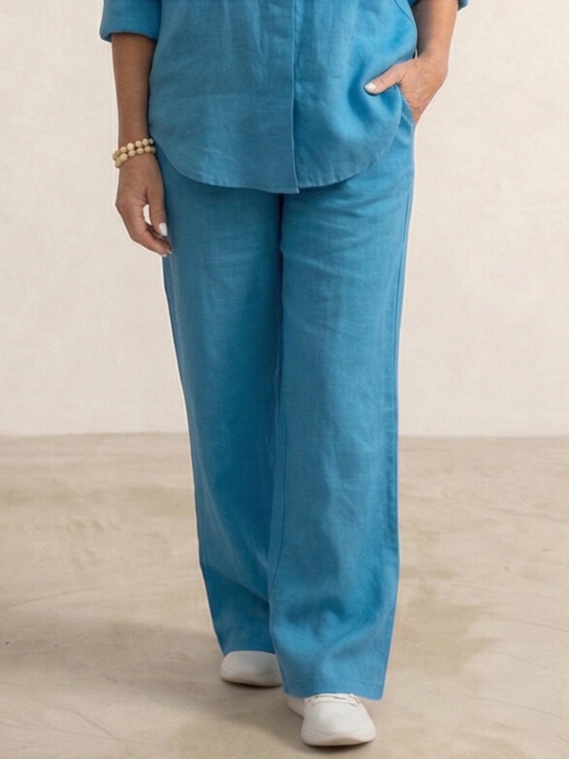 Women wearing a relaxed shirt and trousers two-piece set in soft, breathable fabric for casual, stylish comfort