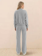 The Voyager Zip Set two-piece zip-front sweatshirt and wide-leg joggers in grey for travel and casual wear