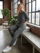 Unisex half-zip pullover and sweatpants set in relaxed fit with soft polyester fabric for casual comfort