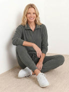 Unisex half-zip pullover and matching sweatpants set in relaxed fit and soft fabric for casual wear