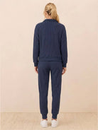 Unisex half-zip pullover and sweatpants set in soft polyester fabric for casual comfort and travel