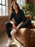 Unisex half-zip pullover and sweatpants set in soft fabric with relaxed fit for casual wear and travel