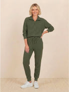 Unisex half-zip pullover and sweatpants set in soft fabric with relaxed fit for casual wear