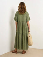 V-neck two-tiered maxi swing dress in flowing cotton fabric with irregular hem and loose sleeves