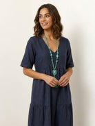 V-neck two-tiered maxi swing dress in cotton with irregular hemline and flowing tiers