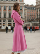 Water-repellent A-line hooded raincoat for women with insulated lining and matching belt