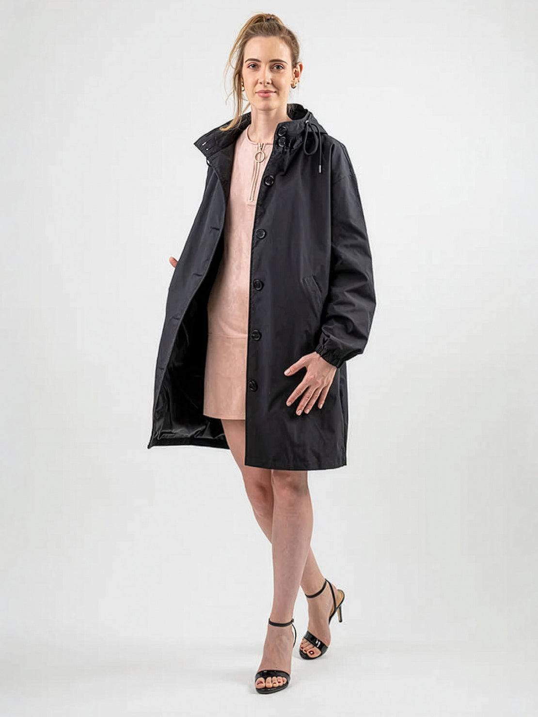 Water-resistant oversized hooded windbreaker rain jacket for outdoor activities