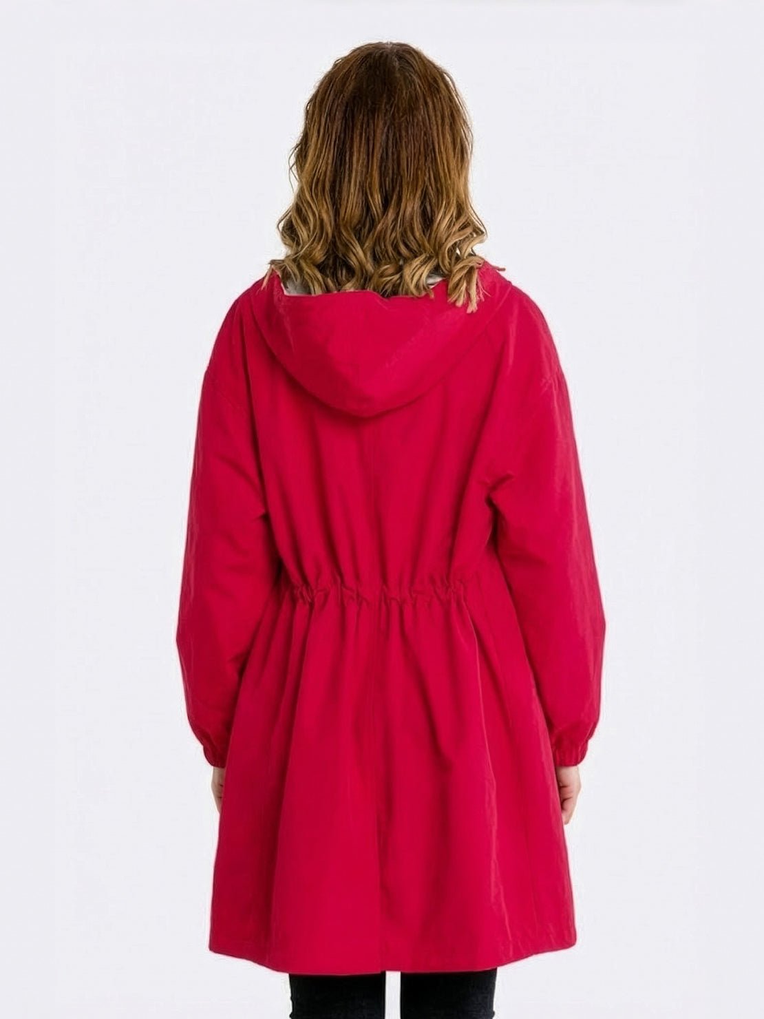 water-resistant oversized hooded windbreaker rain jacket on mannequin outdoors