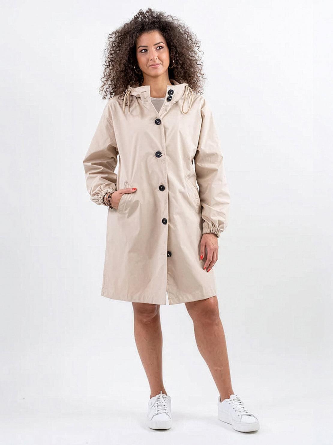 Water-resistant oversized windbreaker rain jacket with hood and multiple pockets for outdoor use