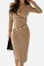 Beige stylish button pencil dress with v-neck and asymmetrical waist design, long sleeves, worn with black handbag